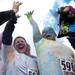 Runners toss powder in the air as they cross the finish line during the Ypsilanti Color Run on Saturday, May 11. Daniel Brenner I AnnArbor.com